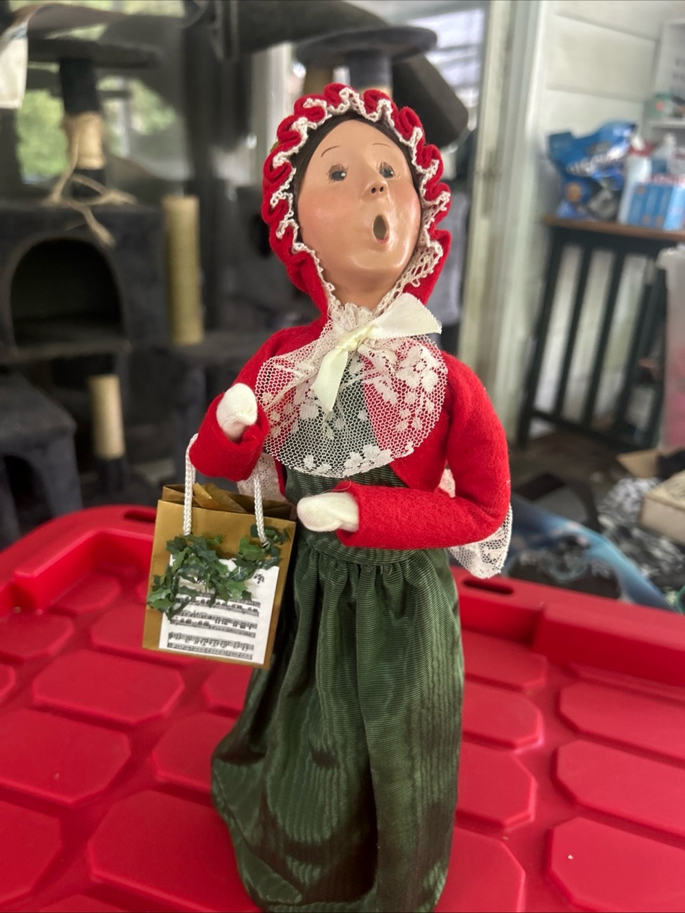 Byers choice Handcrafted Holiday Caroler Doll in Red and Green. Signed
